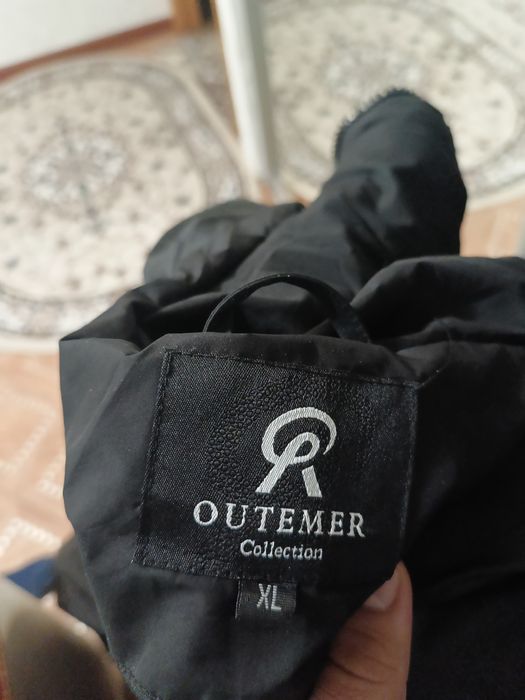 Пуховик зимний новый