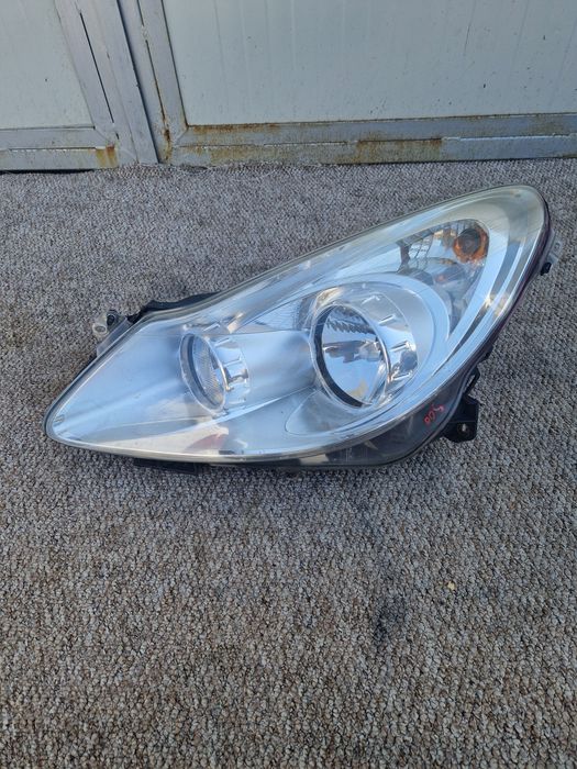 Far stanga Opel Corsa D 2008 cu halogen