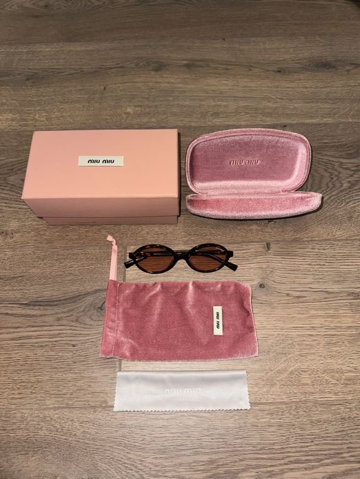 Нови Miu Miu Regard tortoiseshell-effect sunglasses