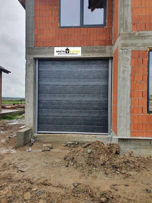 Distribuim la cel mai bun pret usi de garaj-TRANSPORT GRATUIT