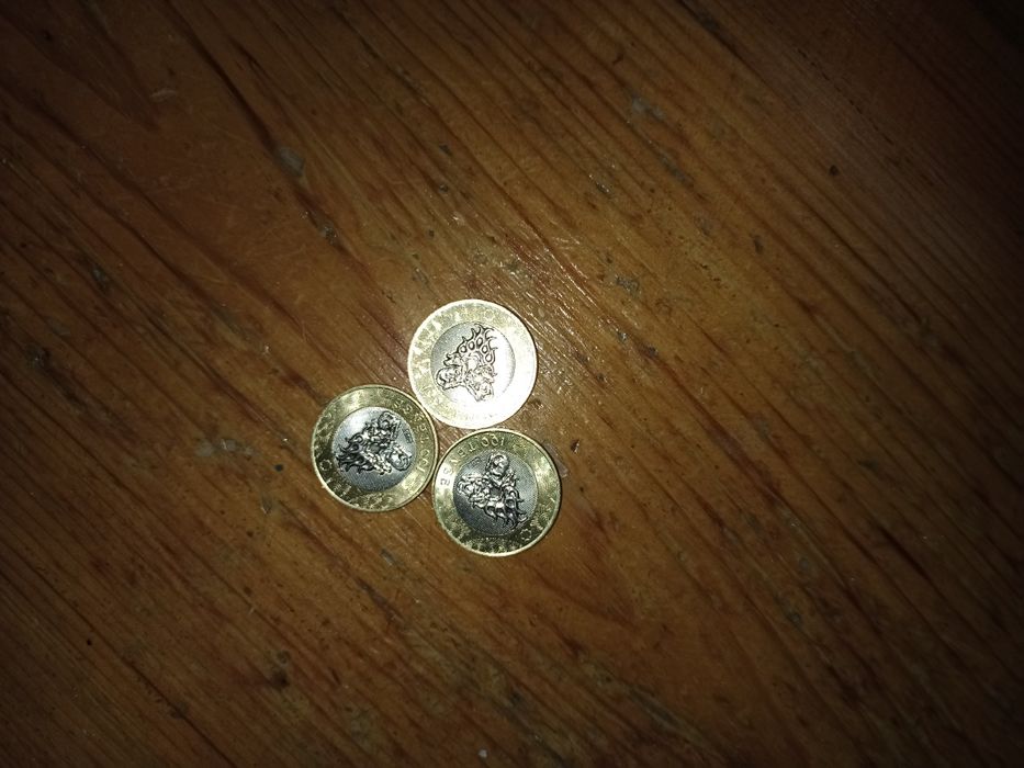 Монеты каждая 100 000 тг