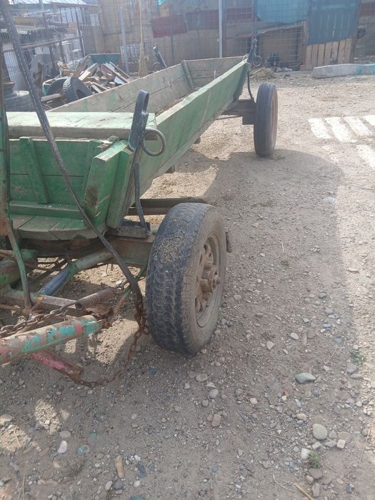 Vand caruta de un cal buna pe fier butuci buni cos  nou