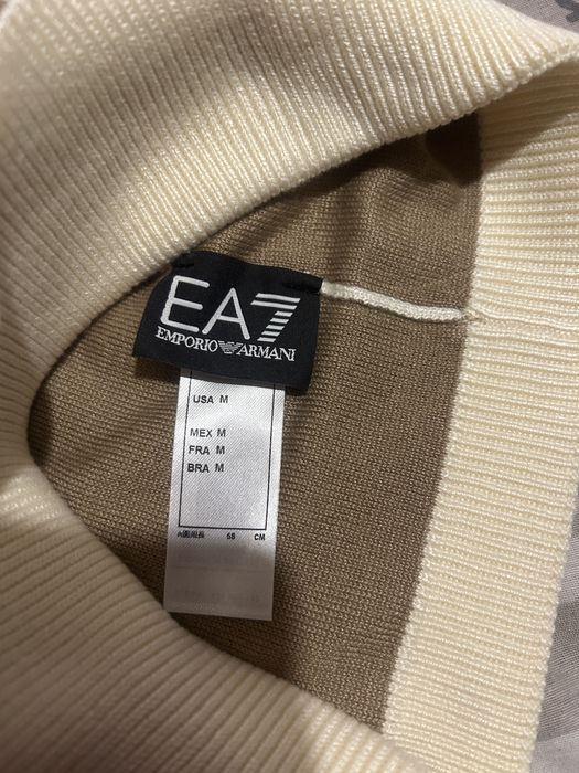 Шапки versace i emporio armani