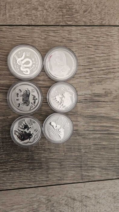 1 унция сребърни монети- Лунари от различни години 1 oz и 1/2 oz