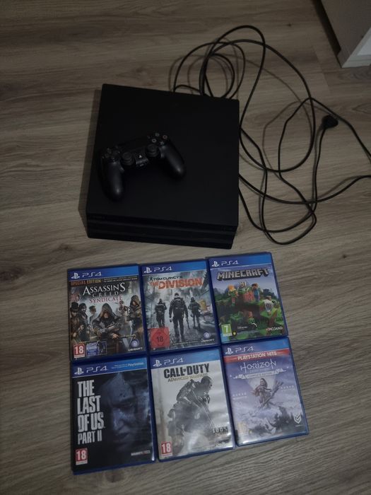 Pachet Complet PlayStation 4 Pro 1TB + Controller + 6 Jocuri de top