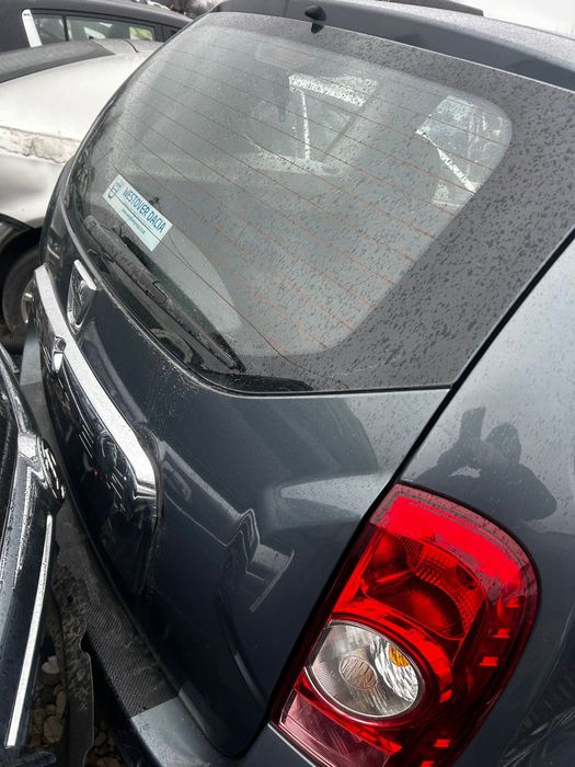 Aripă stânga spate Dacia Duster 2013