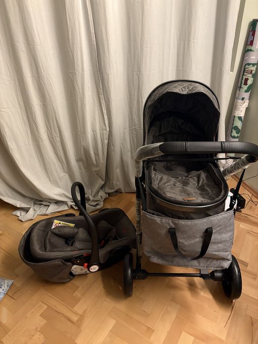 Нова бебешка количка 3 в 1 със столче за кола