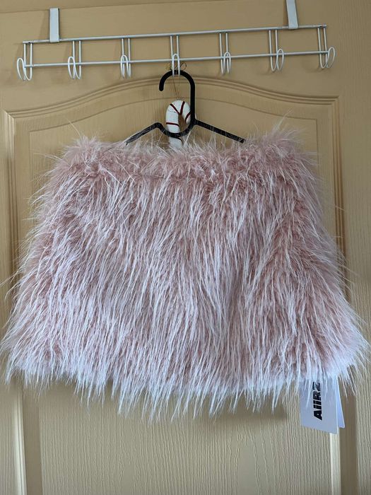 Чисто нова пухкава пола в нежно розов цвят