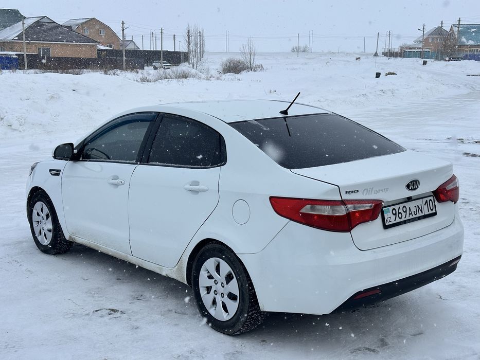 Kia Rio 1.4 MT 2014 год
