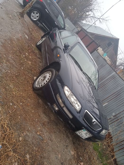 Мазда кседокс 9 1999