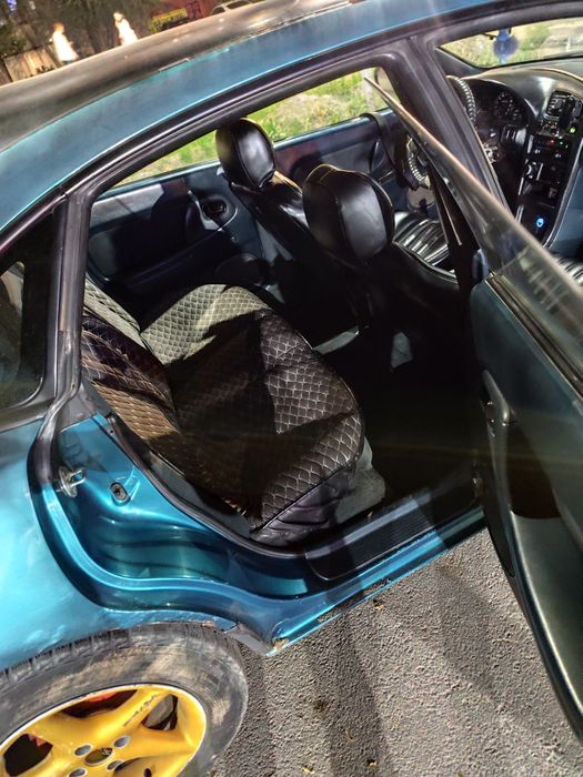 Продам машину срочно Мазда 323Ва 1996