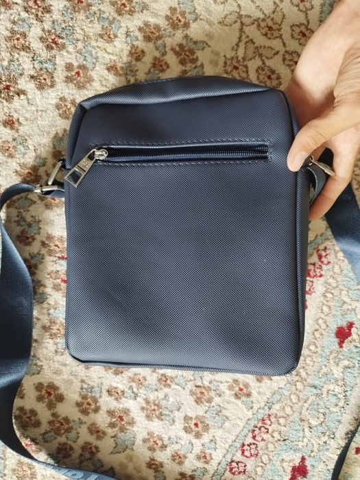 Продам барсетку новый почти не одевался