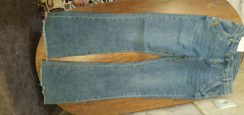 Джинсы клешь 30 размер