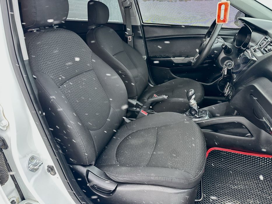 Kia Rio 1.4 MT 2014 год