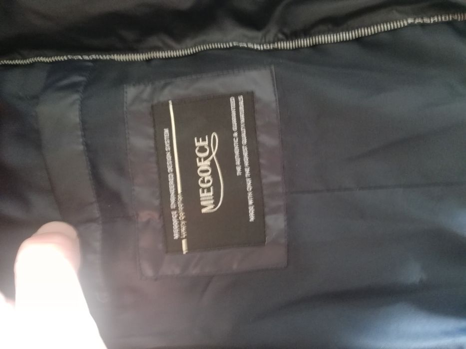 Продаю Женский пуховик.