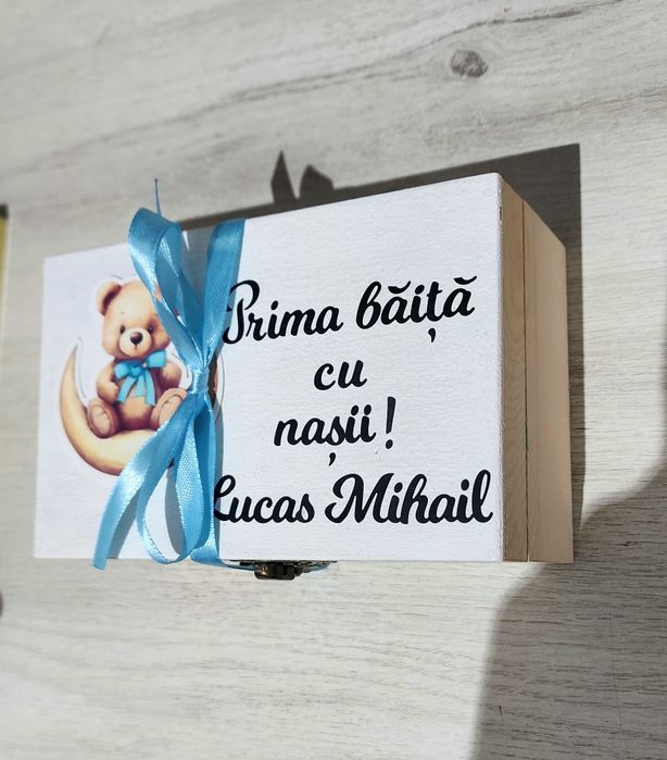 Prima băiță cu nașii