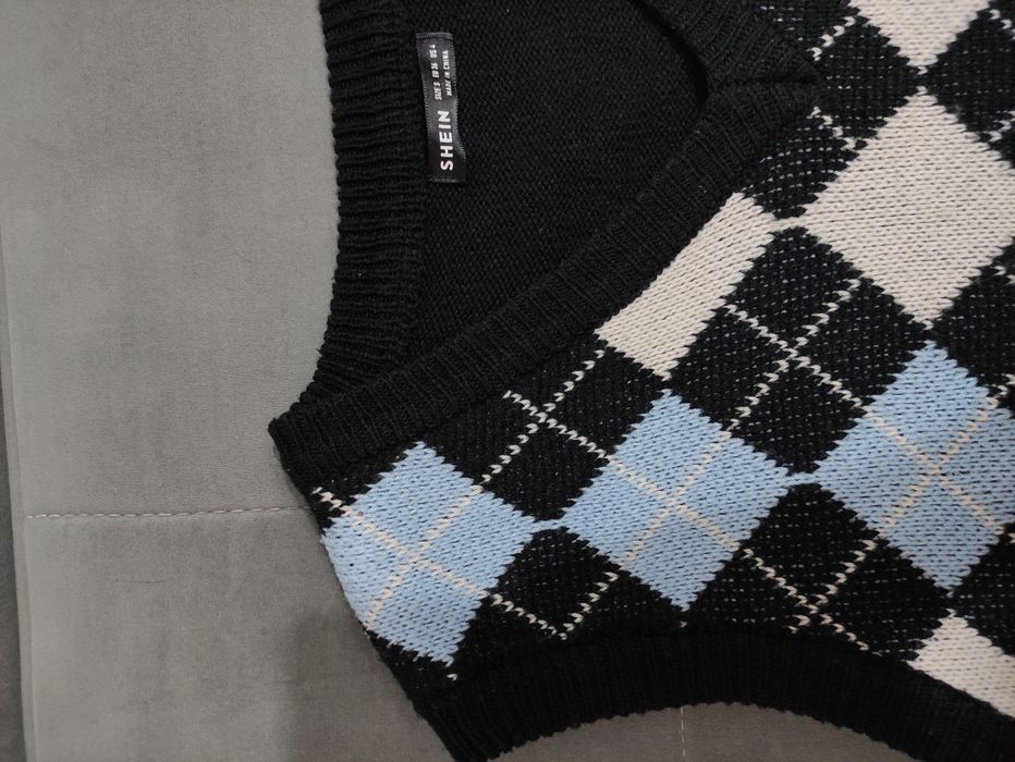 жилетка         .