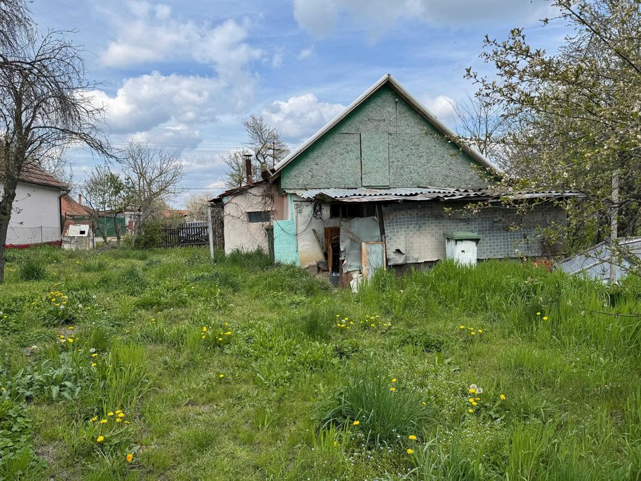 Teren intravilan cu casa batraneasca in vatra satului Dragsina