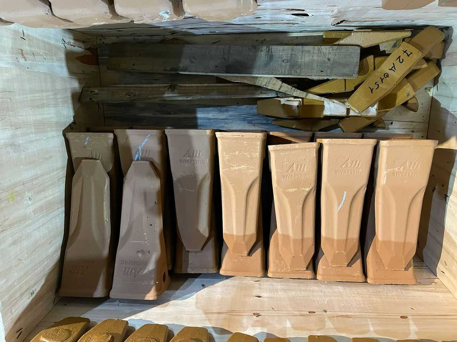 Зубья,адаптеры,фиксаторы,коронки