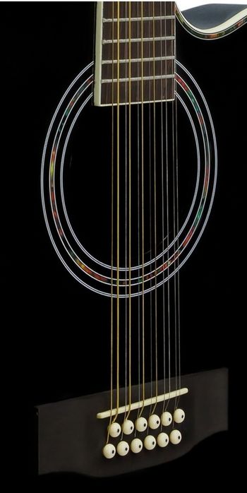 Продам 12 струнную гитару