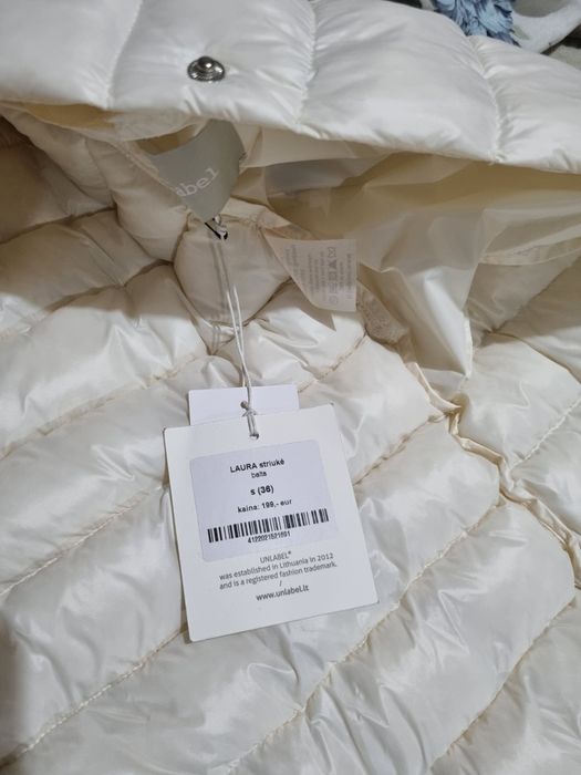 Продам пуховик новый