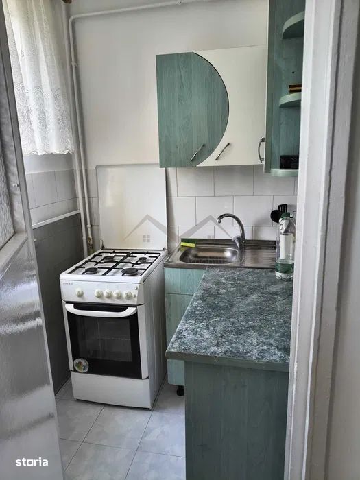 Garsoniera Alexandru etaj intermediar in bloc de apartamente
