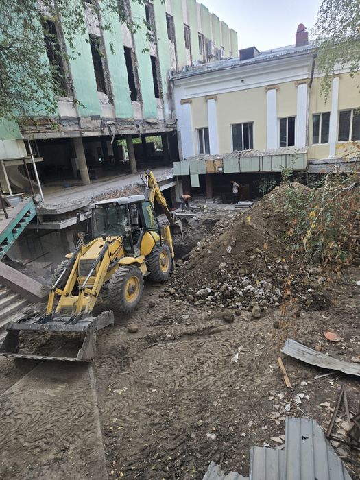 Услуги экскаватора погрузчика гидромолот