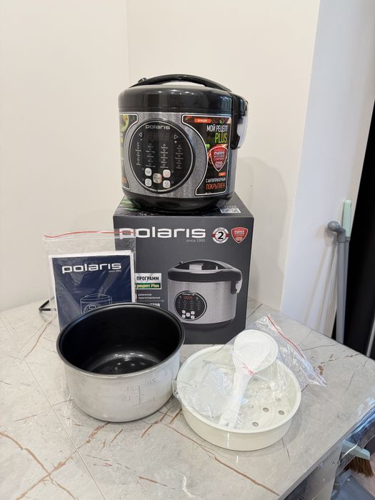 Продам мультиварку Polaris , черная