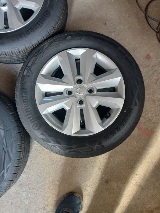 Set jante cu capace anvelope continental 185 65 15 Dacia Logan Sandero