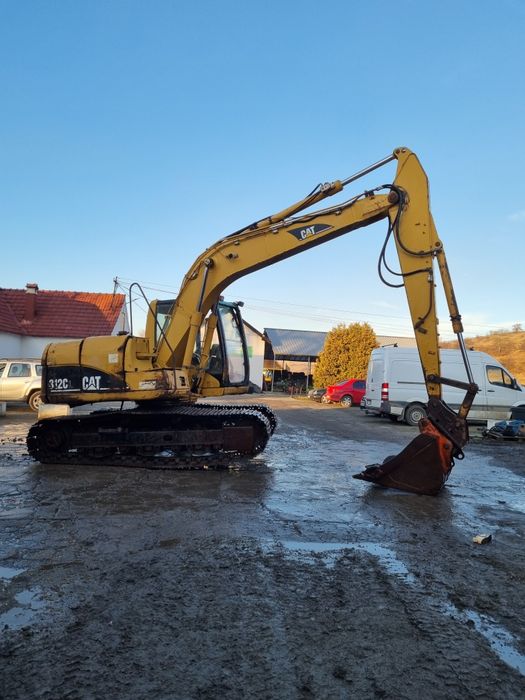Dezmembram excavator Caterpillar 312 LC — poza 4