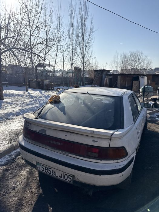 Мазда 323 бензин