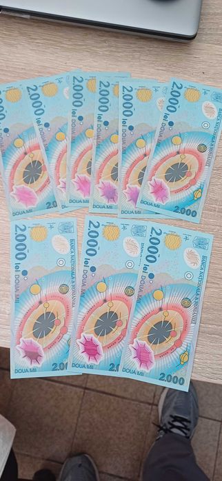 9 bancnote 2000 lei cu eclipsa solara