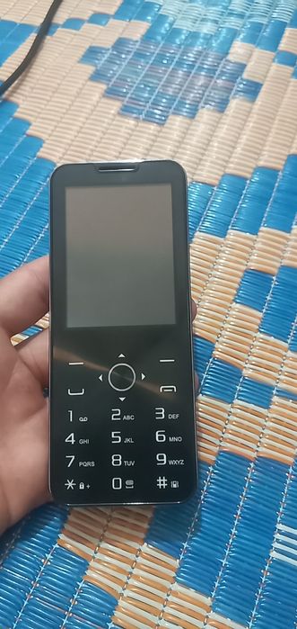 P 14 Pro knopishni telefon aybi yoq karobkasi bor