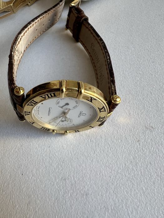 18 k aur Omega Constellation Day-Date,quartz ref.196.1070 cal.1444