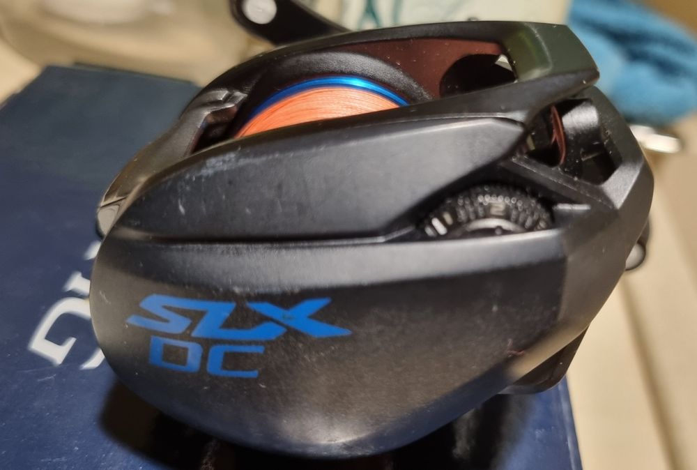 Shimano SLX DC 151HG + cutie + factură – stare foarte bună