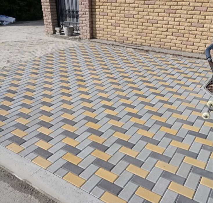 Укладка брусчатки, Тратуарный плитка.