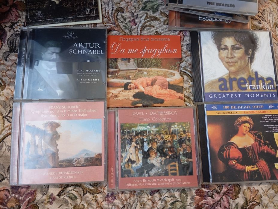 Cd дискове с рок музика и класика