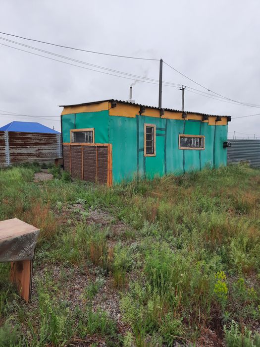 Земельный участок с постройкой