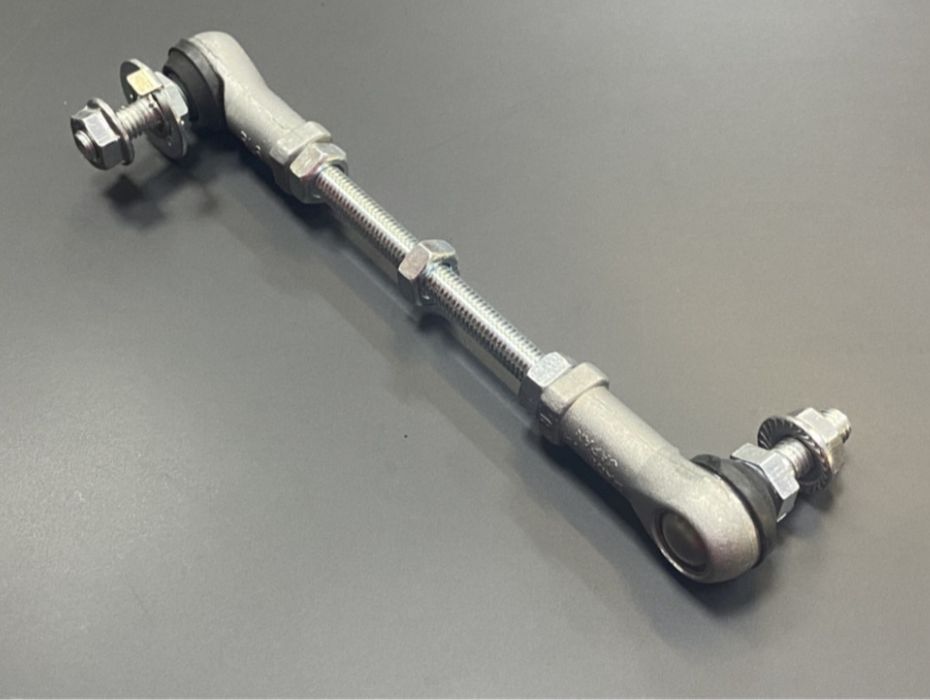 Тяга корректора фар