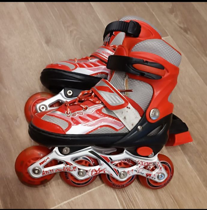 Роликовые коньки.