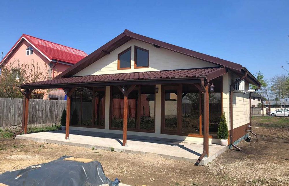 Casa modulara, garaje auto si containere tip birou din structura metalica si panou sandwich termoizolant