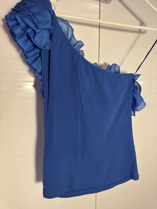 Син потник с едно рамо