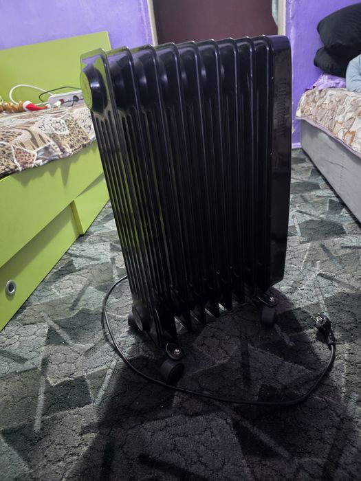 Vând calorifer electric pe ulei Hainner 2 trepte 9 Elemenți cu termost