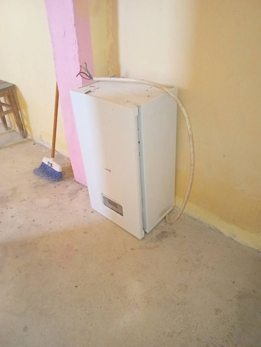 Vând centrala pe peleti de 12kw încălzește 100mp patrati