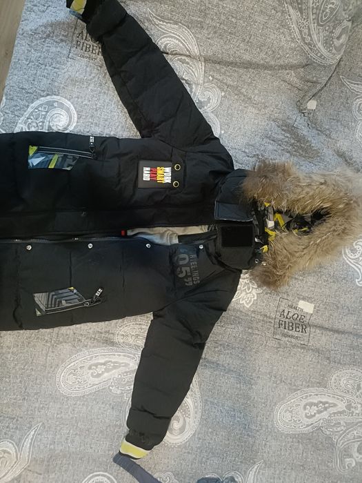 Продам зимний пуховик на мальчика