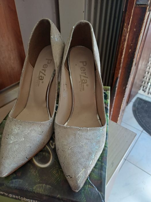 Обувки носени един два пъти. Почти нови с резервни капачки