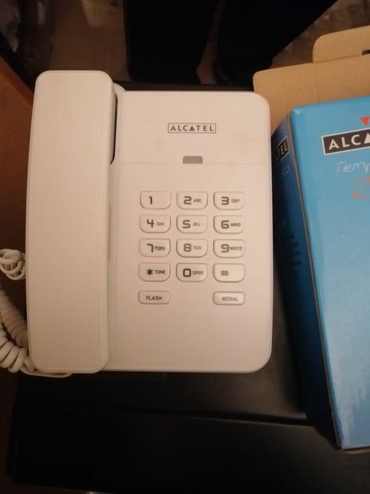 Телефон с копчета ALCATEL