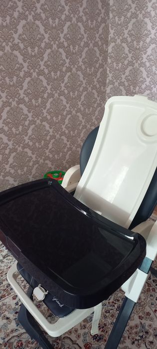 Детский стульчик на колесах.