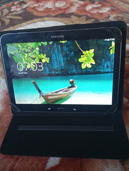Samsung și IPad se vede in fotografii