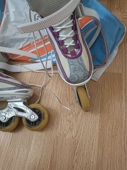 Роликовые коньки